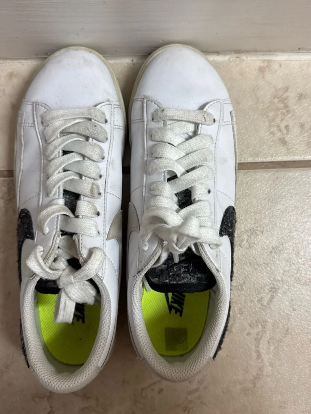 Nike White Sneakers with Black Swoosh and Neon Yellow Insole